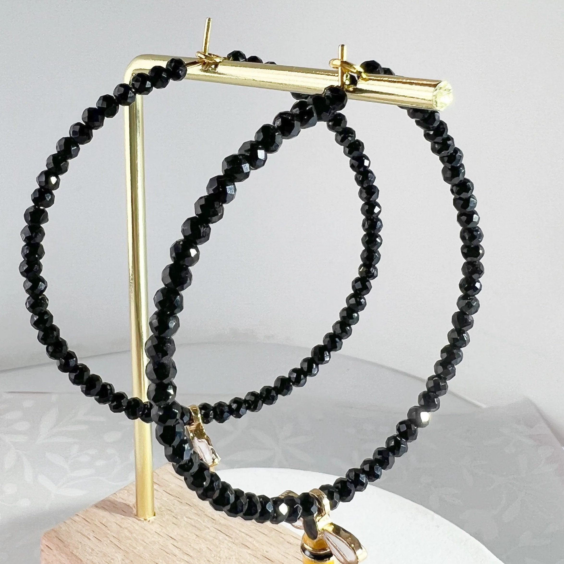 Black bug earring hoops