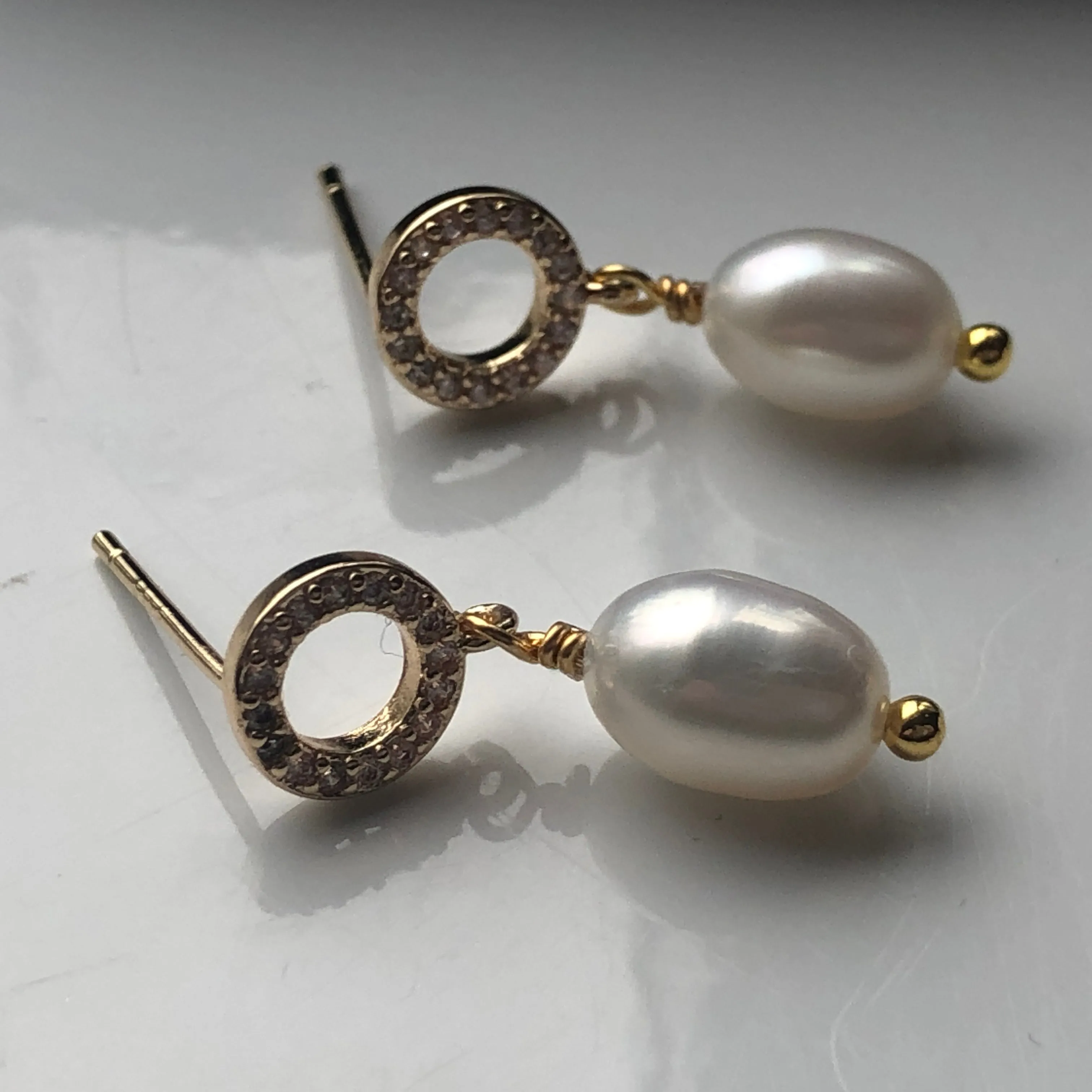 Earrings: Ivory freshwater pearl drop on a delicate pretty gold plated post