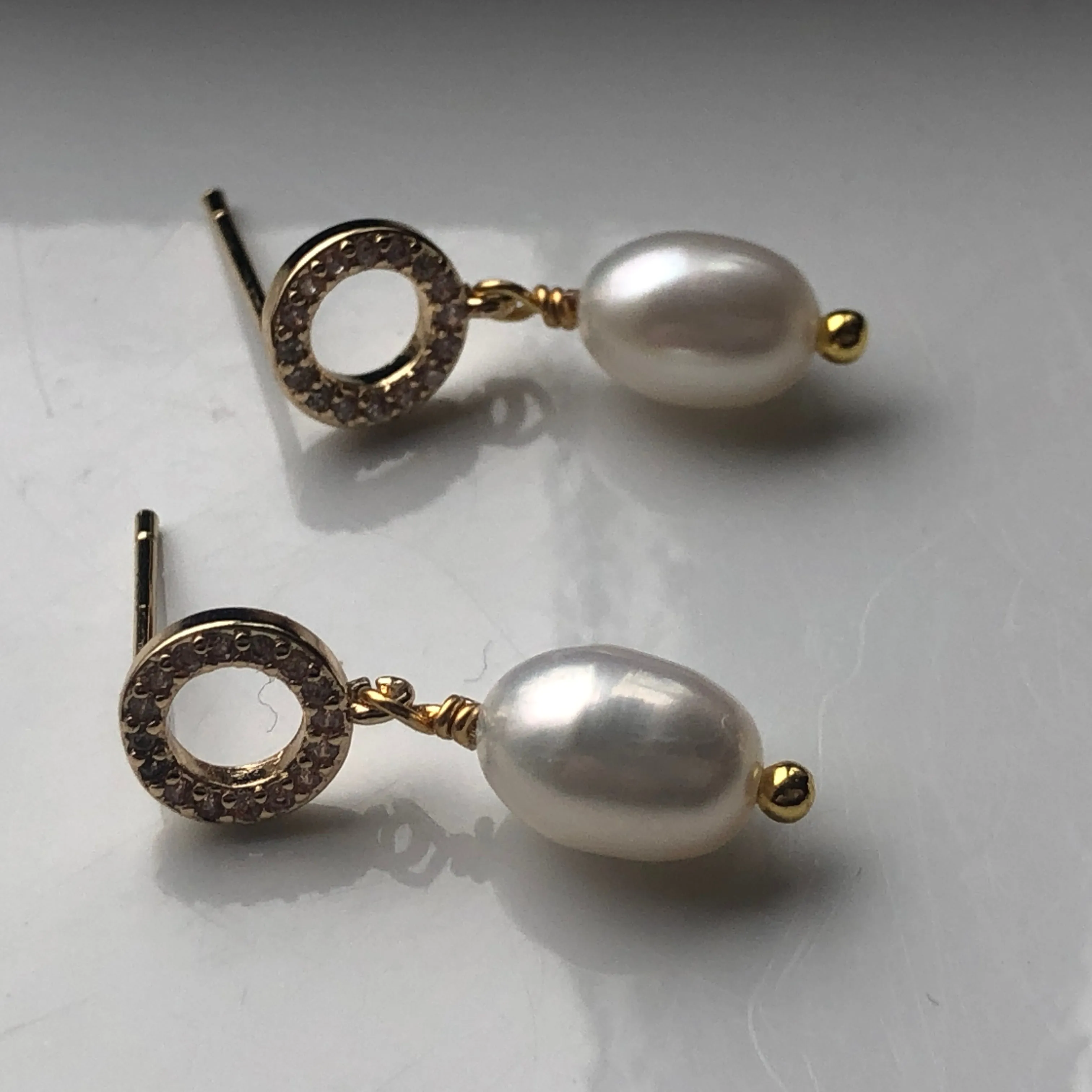 Earrings: Ivory freshwater pearl drop on a delicate pretty gold plated post