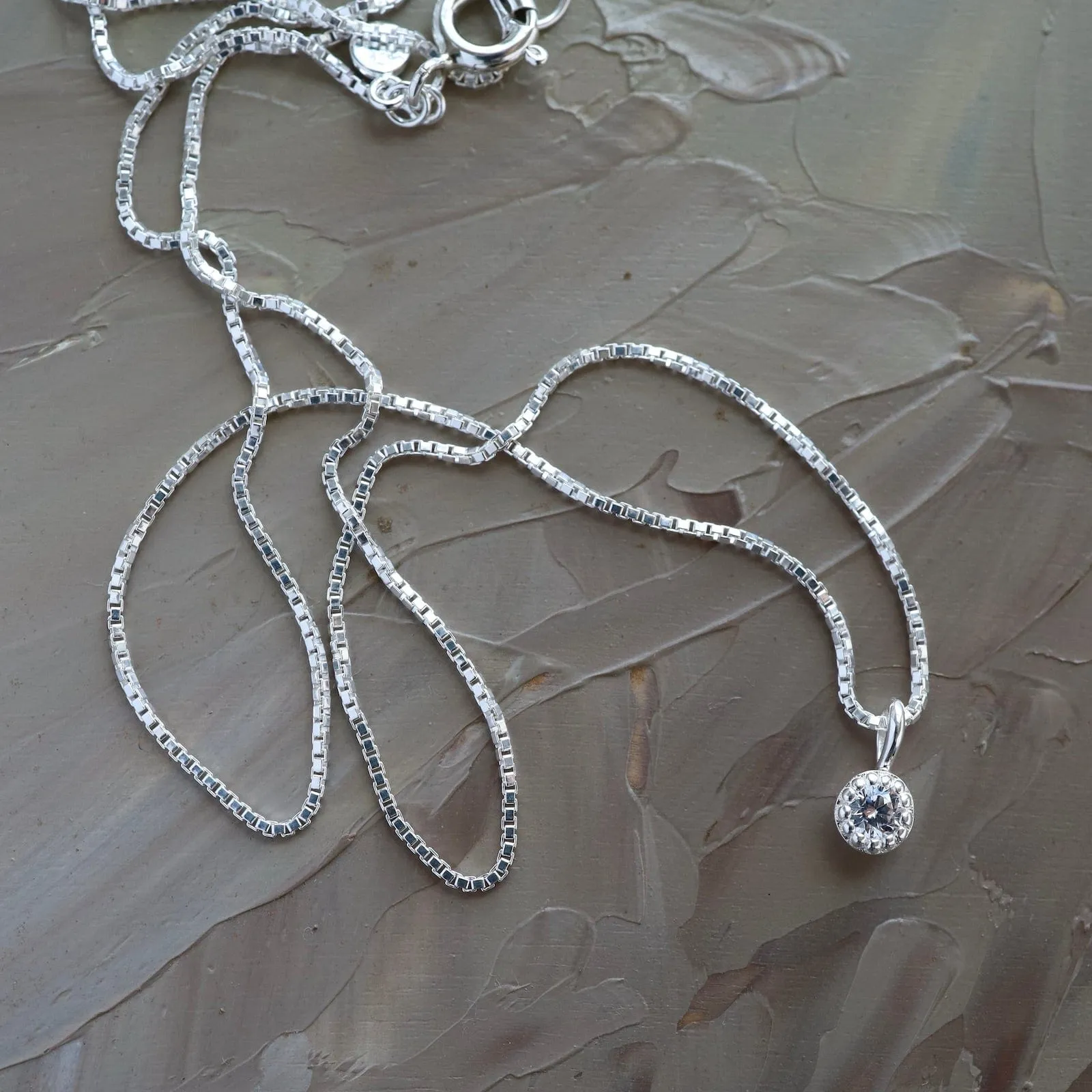 Milgrain Edge Round CZ on Sterling Silver Box Chain