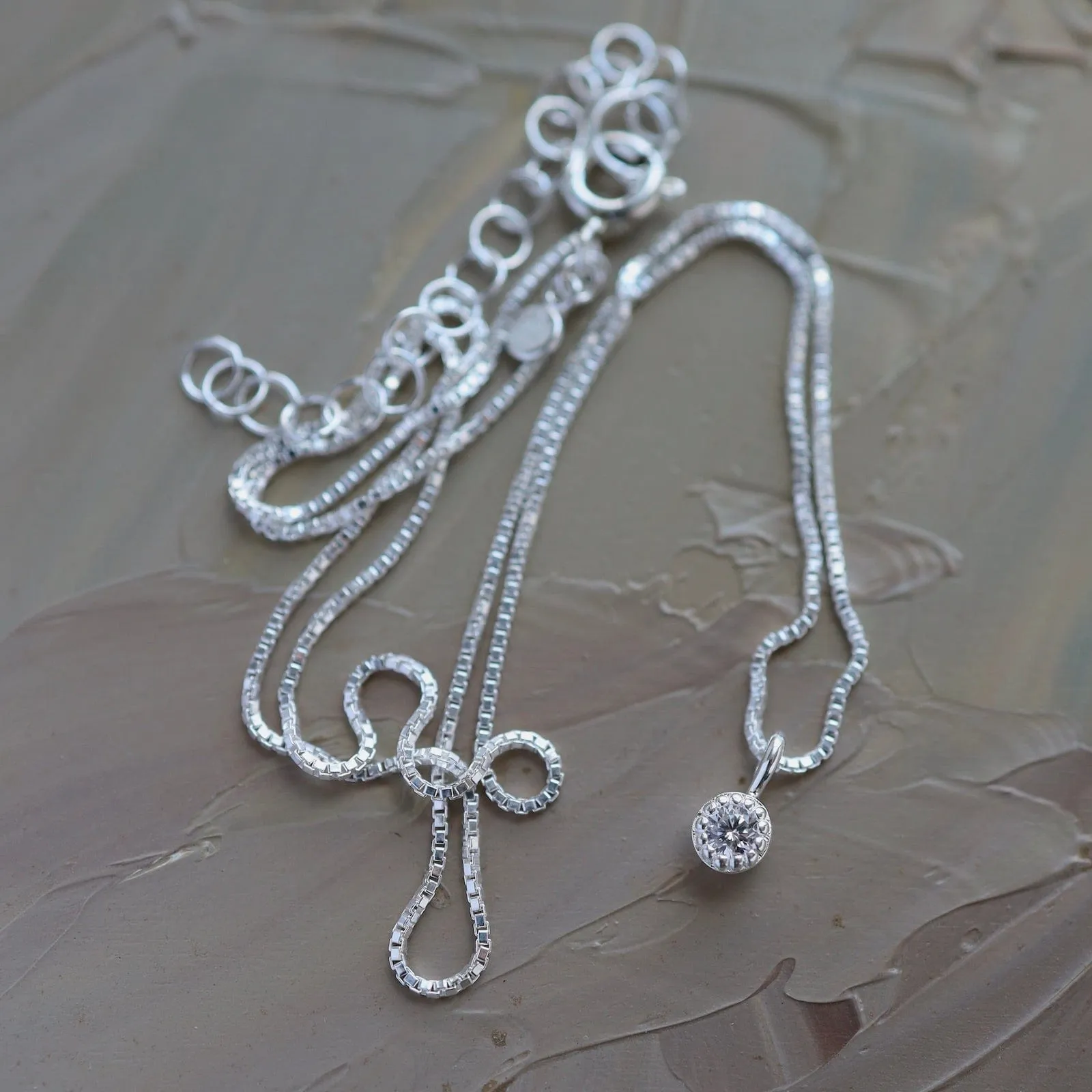 Milgrain Edge Round CZ on Sterling Silver Box Chain
