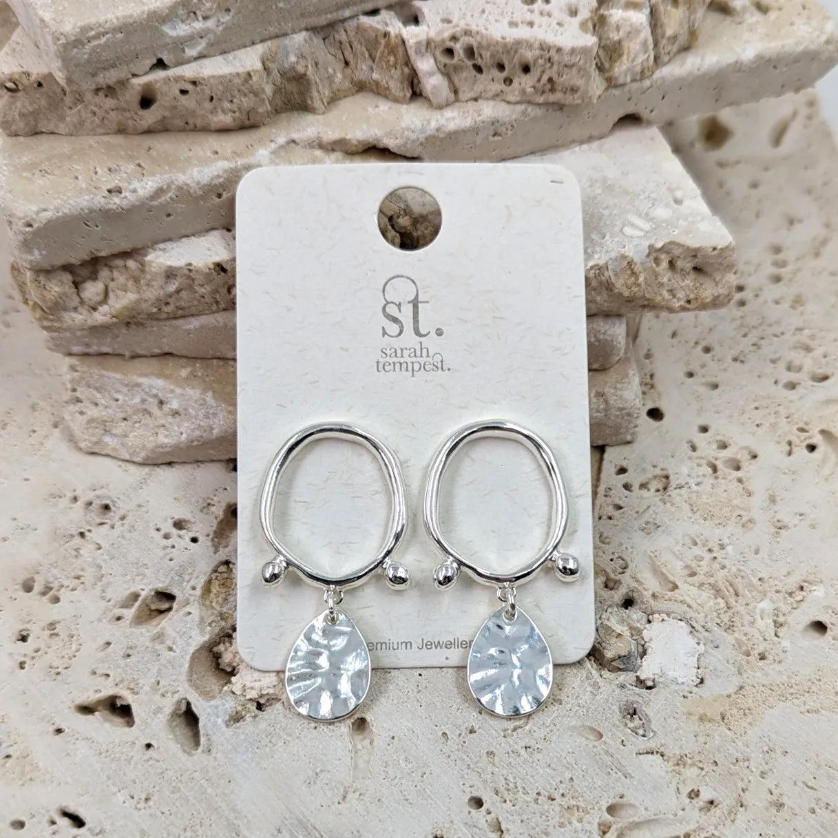 Open organic circle earrings with beaten drops and fixed balls